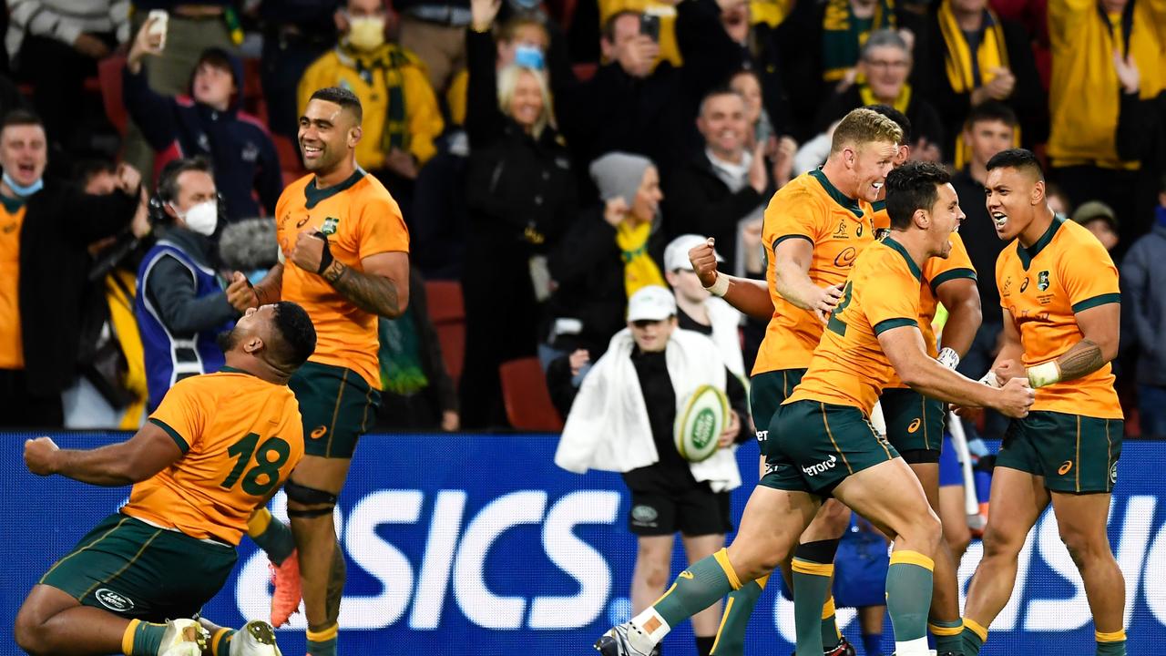 The Wallabies celebrate their famous win over France at Suncorp Stadium. Photo: Getty Images