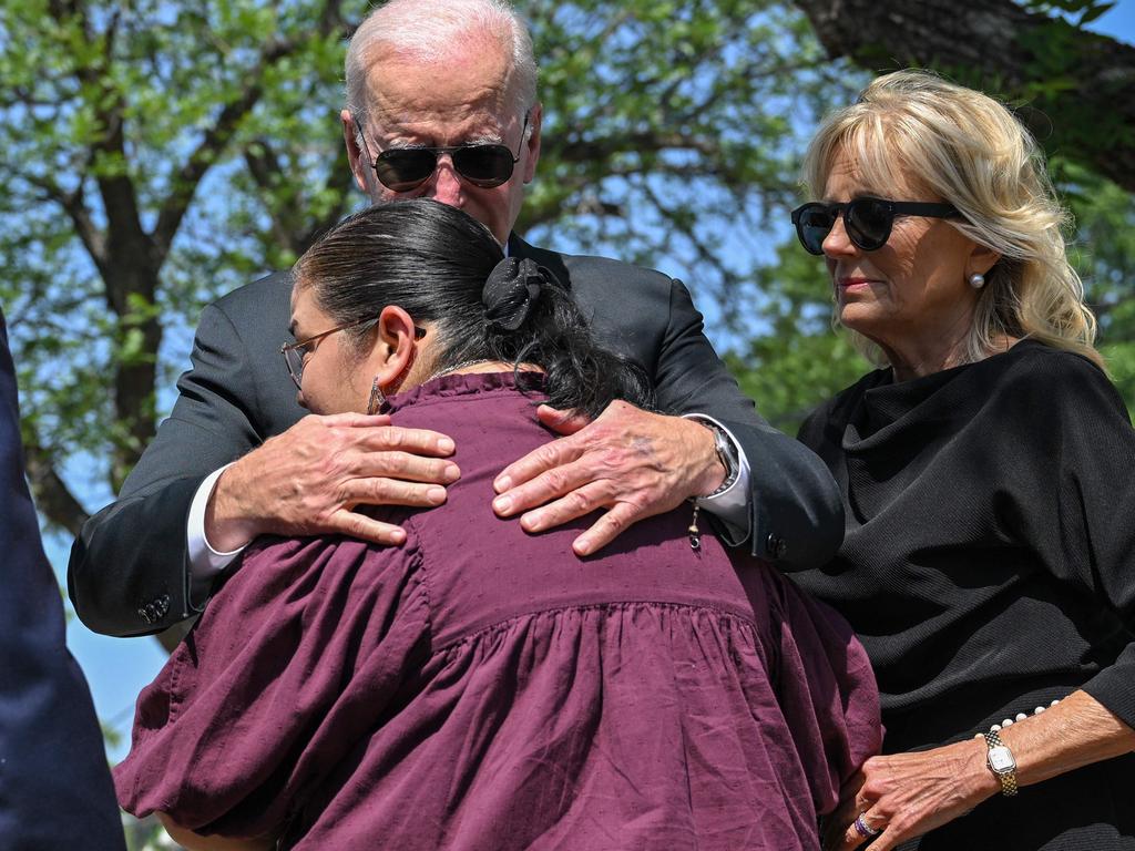 US President Joe Biden embraces Mandy Gutierrez, the Pricipal of Robb Elementary School, in Uvalde, Texas on May 29, 2022. Picture: Mandel Ngan / AFP.