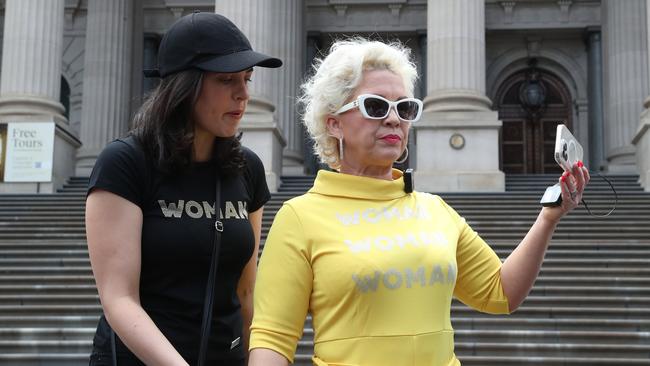 Kellie-Jay Keen, right, with Liberal Moira Deeming in front of the Victorian Parliament on Saturday.. Picture: David Crosling