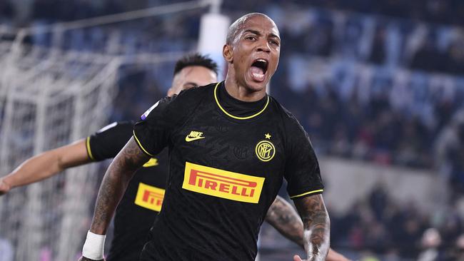 Inter Milanâ€™s Ashley Young celebrates after scoring his side's first goal during the Serie A soccer match between Lazio and inter Milan, at Rome's Olympic stadium, Sunday, Feb. 16, 2020. (Alfredo Falcone/LaPresse via AP)