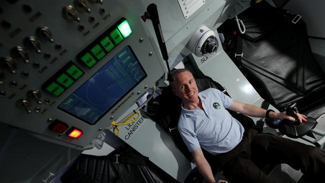 Adam Gilmour at the Gilmour Space Technologies space academy. The centre have various command and space craft displays. Picture: Scott Fletcher