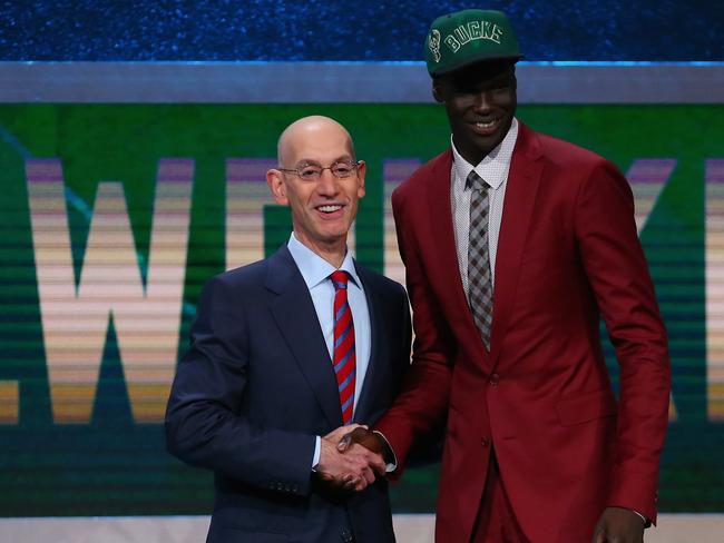 Thon Maker with Commissioner Adam Silver after being drafted 10th overall by the Milwaukee Bucks