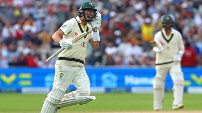 Pat Cummins (L) and Australia's Nathan Lyon pulled off a win for the ages. Picture: AFP.