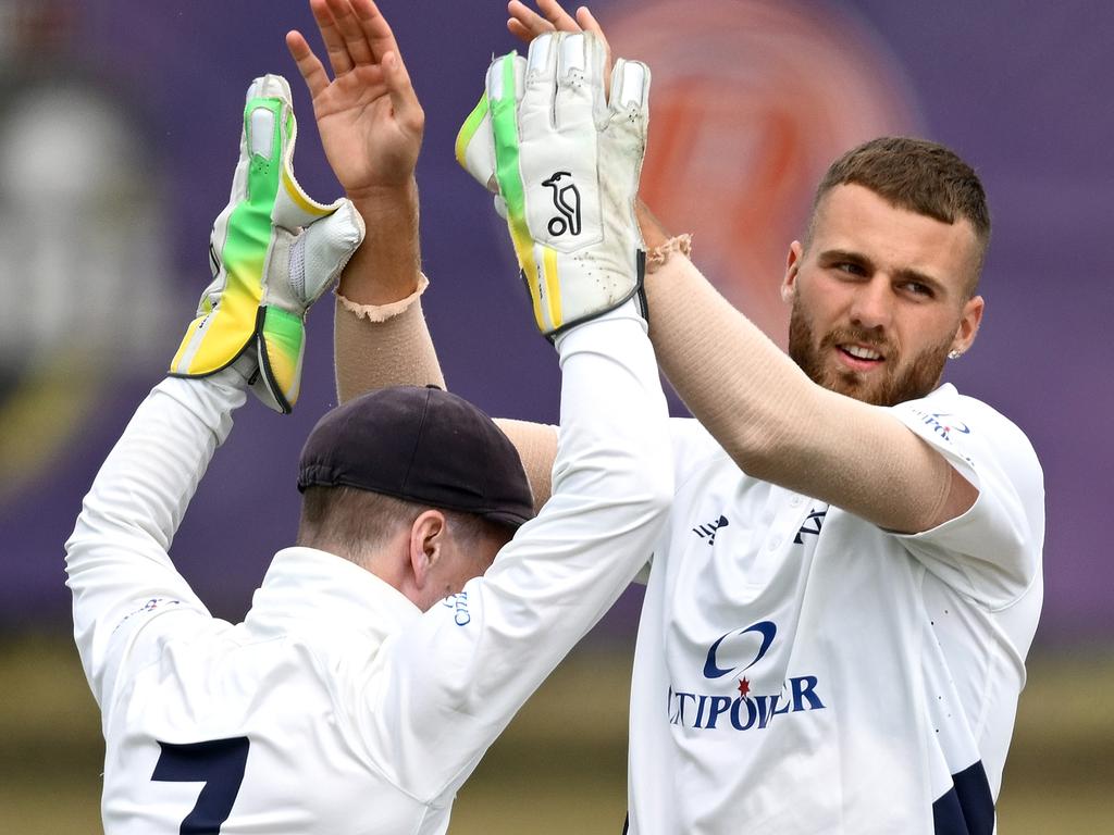 Fergus O’Neill (right) celebrates a scalp for Victoria. Picture: Quinn Rooney/Getty Images