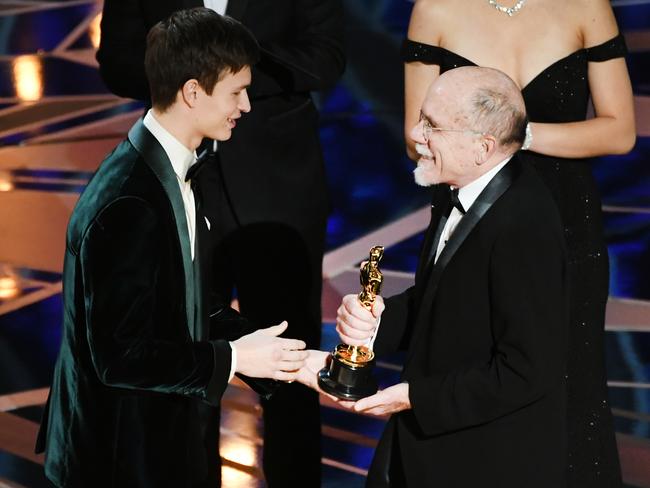 Sound designer Richard King, right, accepts Best Sound Editing for Dunkirk from actor Ansel Elgort. Picture: Getty Images