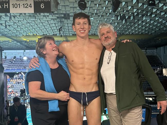Tasmanian swimmer Max Giuliani with mum Jo Spargo and dad Mic Giuliani in Brisbane at the Australian Olympic trials where Max won the men's 200m freestyle and a spot on the team for the Paris Olympics