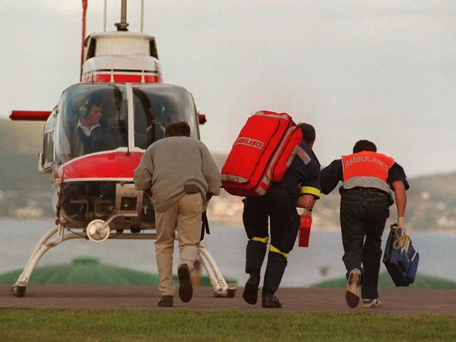 Parademics leaving Hobart by helicopter to go to the massacre site.