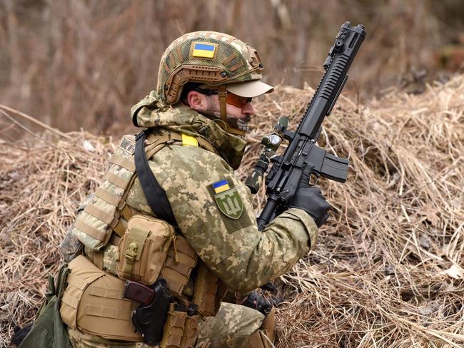 A member of the Ukrainian Territorial Defence Forces takes part in tactical exercises near the western Ukrainian city of Lviv. Picture: AFP