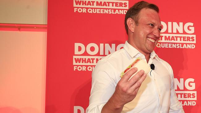 Premier Steven Miles holds his party launch at the North Lakes Community Centre. Premier Miles makes a sandwich with his daughter Bridie 10 on stage. Pics Adam Head