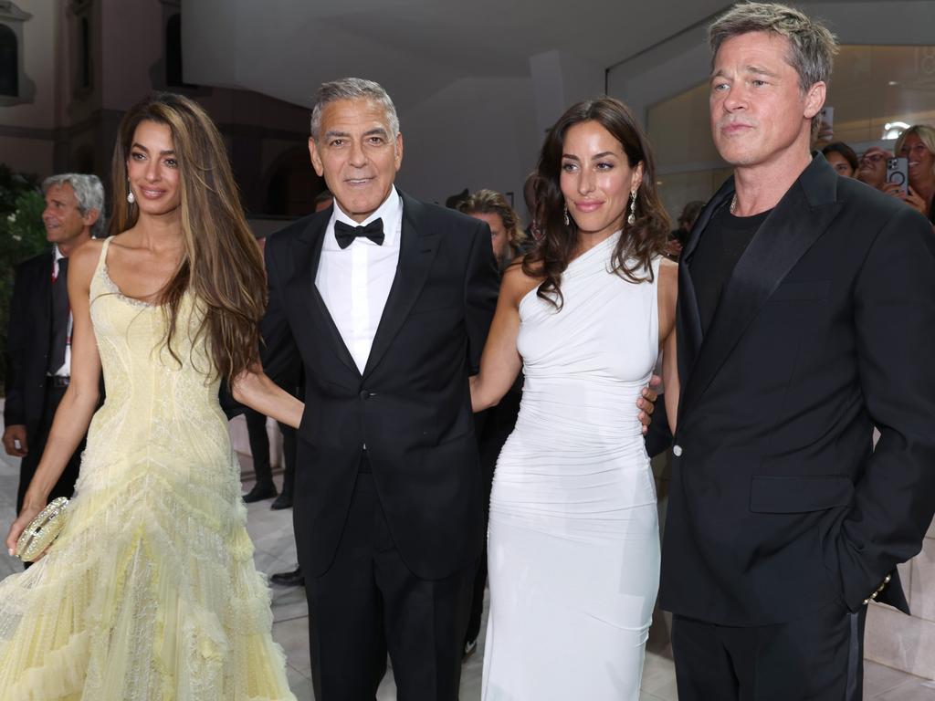 Original ER star George Clooney (second from left), with Amal Clooney, Brad Pitt (far right) and Ines de Ramon in Venice last year. Picture: Getty Images