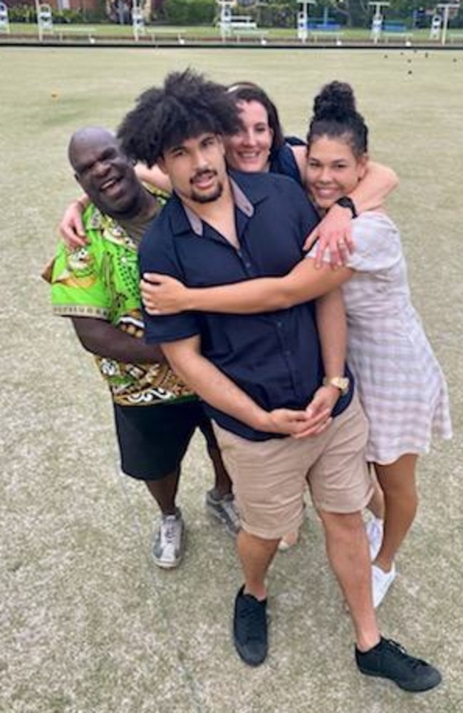 Margie Babia with her husband and two children at her 50th birthday party.