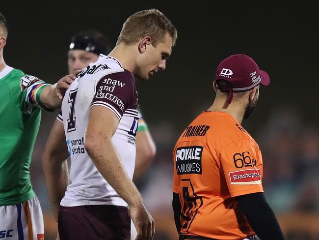 Canberra's Jack Wighton pats Manly's Tom Trbojevic on the back as he leaves the field injured during the Manly Sea Eagles v Canberra Raiders NRL match at Campbelltown Stadium, Sydney. Picture: Brett Costello