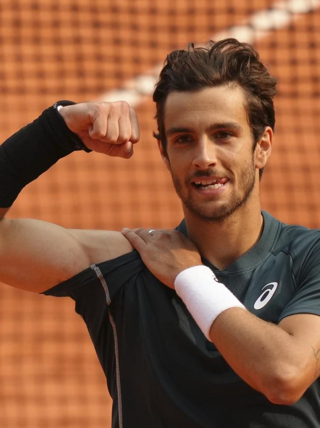 Lorenzo Musetti celebrates after beating Tiafoe. (AP Photo/Aurelien Morissard)
