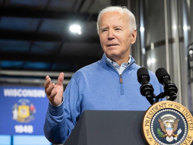 TOPSHOT - US President Joe Biden speaks about his Investing in America and Bipartisan Infrastructure plans at Earth Rider Brewery in Superior, Wisconsin, on January 25, 2024. (Photo by SAUL LOEB / AFP)