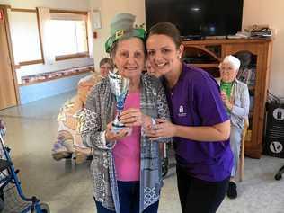 COVETED PRIZE: Residents from Dougherty Villa and Grafton Aged Care Home contested the Elder Olympics for the right to take home the Olympic Torch. Picture: Halls & Pryor Aged Care Group