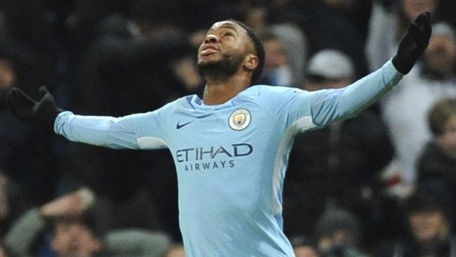 Manchester City's Raheem Sterling celebrates after scoring his winner.