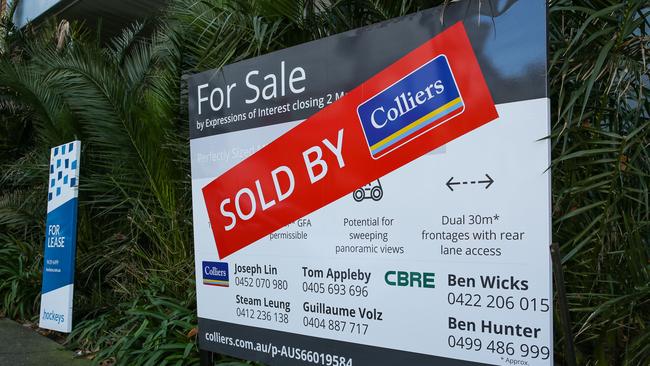 SYDNEY, AUSTRALIA  - Newswire Photos  AUGUST 08 2023: A view of the a property for sale with a sold stocker across the sign on the Northern Suburbs of Sydney. Australiaâs building approvals have slumped to their lowest level in almost three years as soaring interest rates and surging material cost hammer demand for new housing. In the 2022-23 financial year, building approvals plunged by 18 percent, with just 176,000 new dwellings approved in the 12 month period.  Picture NCA Newswire/ Gaye Gerard