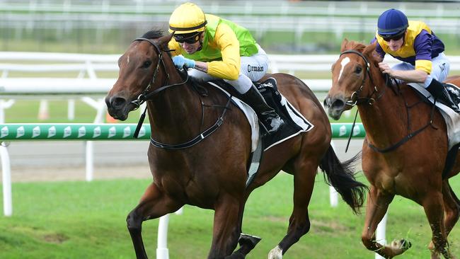 Jockey Jimmy Orman wins aboard All That Pizzazz to secure his maiden jockeys title at Doomben. Picture: Grant Peters - Trackside Photography