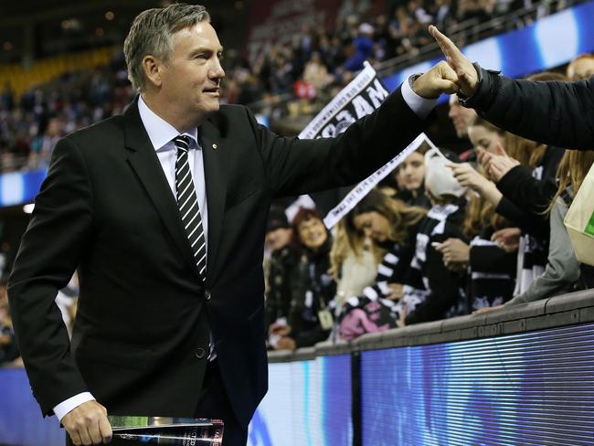 Collingwood president Eddie McGuire celebrates the win with fans. Picture: Michael Klein