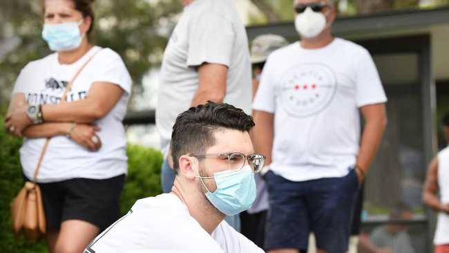 Taylor Raymond waits in line for COVID testing outside Buderim Medical Centre. Picture: Patrick Woods.