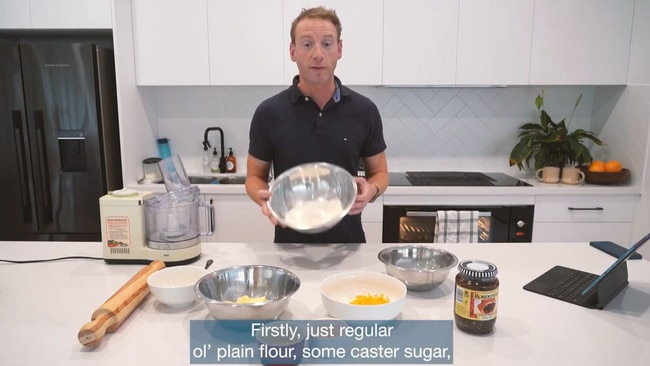 David Speirs baking fruit mince pies in his kitchen in a video posted on YouTube.