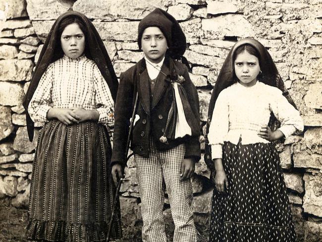 Lucia dos Santos, Francisco and Jacinta Marto. Picture: AFP