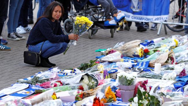 Leicester City fans pay their respects at the team’s stadium to Vichai Srivaddhanaprabha. Picture: Reuters