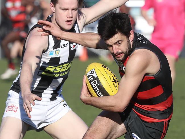 TSL: Lauderdale vs. Glenorchy, Lauderdale Oval: Lauderdale's Alex Hevey takes a mark Picture: LUKE BOWDEN