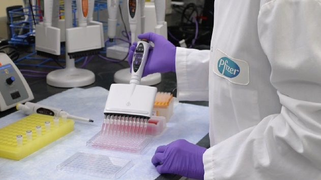 A Pfizer employee works on a COVID-19 vaccine. Picture: Pfizer