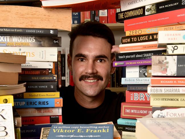 Dylan Conway with some of his many books at his Burdell home. Picture: Evan Morgan