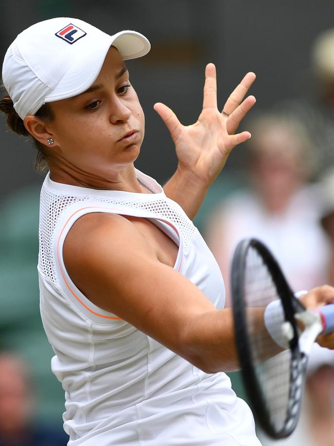 Ash Barty attacks with the forehand against Harriet Dart. Picture: AFP