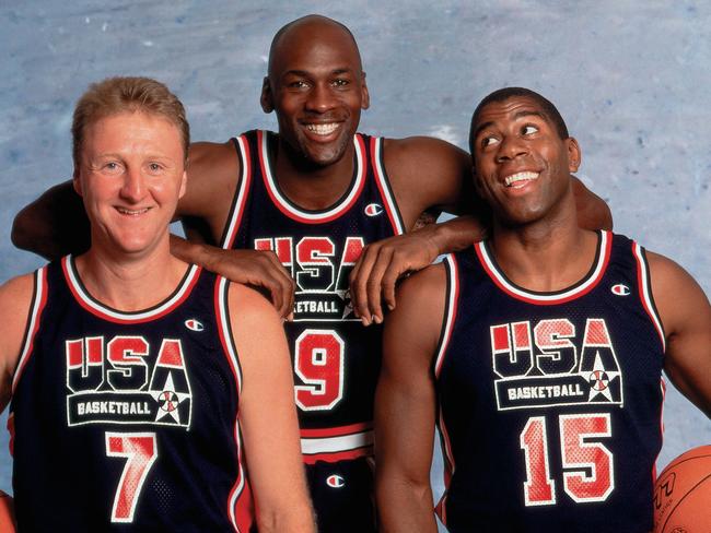 BARCELONA, SPAIN - 1992: Larry Bird #7, Michael Jordan #9, and Magic Johnson #15 of the United States National Team pose for a photo during the1992 Summer Olympics in Barcelona, Spain. NOTE TO USER: User expressly acknowledges that, by downloading and or using this photograph, User is consenting to the terms and conditions of the Getty Images License agreement. Mandatory Copyright Notice: Copyright 1992 NBAE (Photo byNeil Leifer/NBAE via Getty Images)