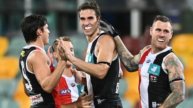 Max King celebrates with teammates Jacke Steele, Jack Lonie and Tim Membrey. Picture: Quinn Rooney/Getty Images)