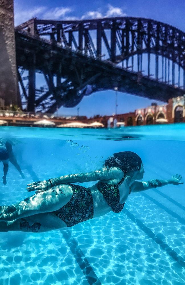 Alyce Bennett cools off in North Sydney Olympic Pool during a summer heatwave. Picture: Nicholas Eagar