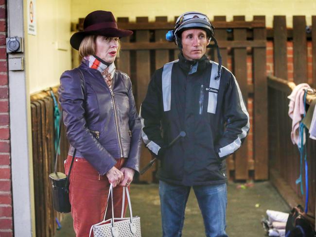 Damien Oliver chats with trainer Gai Waterhouse after trackwork at Moonee Valley on Thursday morning. Picture: Colleen Petch