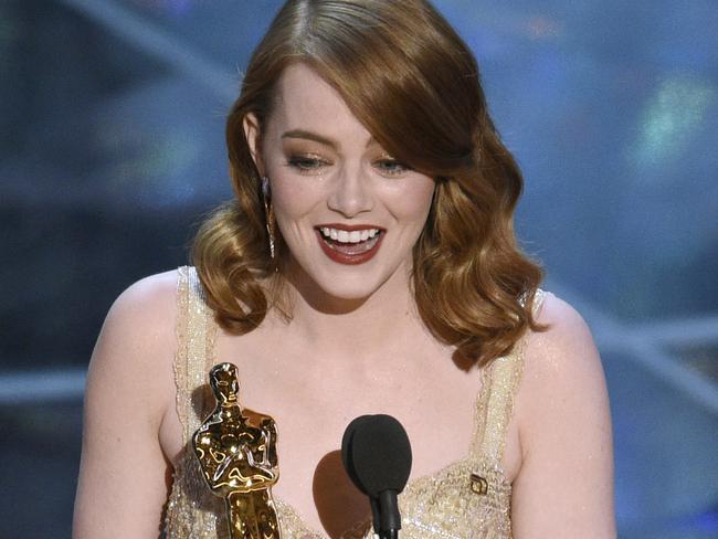 Emma Stone accepts the award for best actress in a leading role for La La Land at the Oscars. Picture: AP