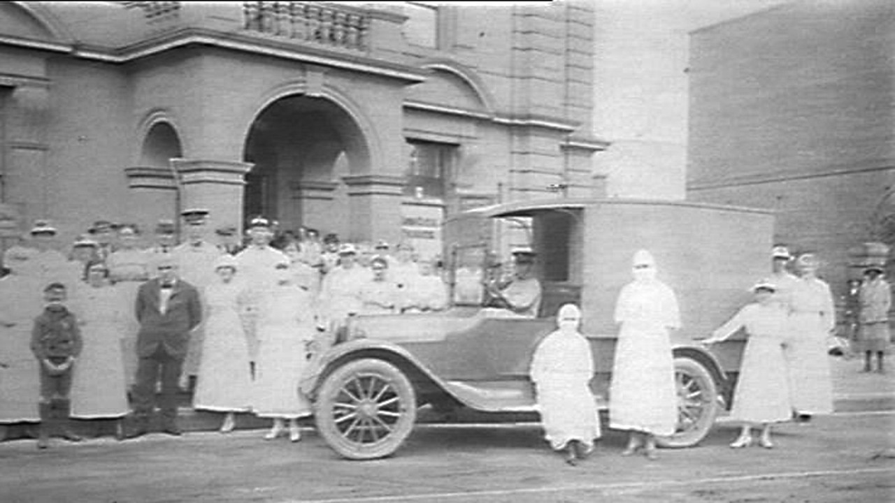 Ambulance and staff outside Depot, Balmain Town Hall in 1919. Source: collection.sl.nsw.gov.au/record/1DrLEyb9