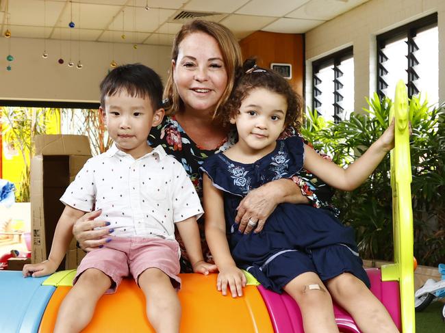 Nicky Upfold at her Artarmon childcare centre with children Sophia and Archer. Picture: Richard Dobson