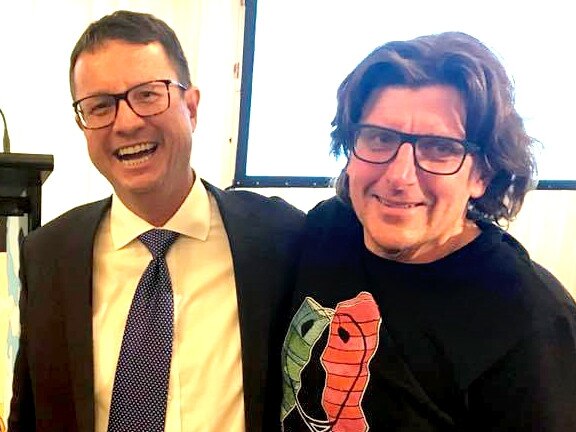 Cardiologist Geoff Toogood, who established the charity CrazySocks4Docs, with Australian Medical Association president Professor Steve Robson. Picture - Supplied