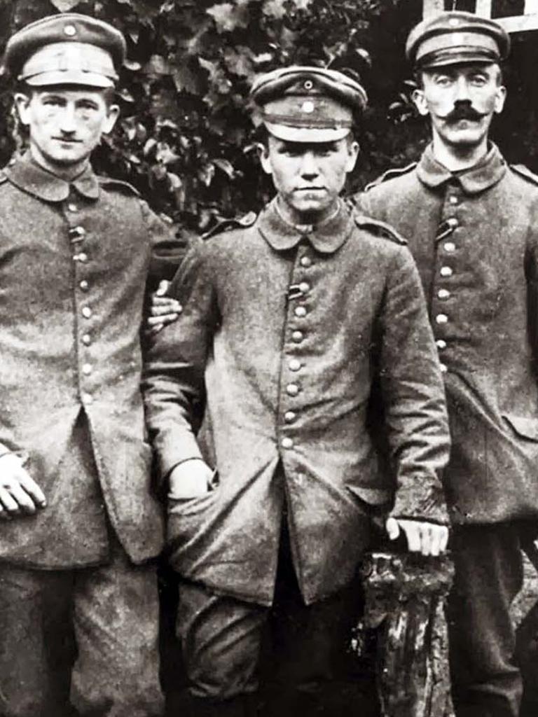 Adolf Hitler (right) as a young corporal.