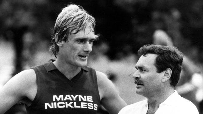 Peter Moore and Ron Barassi in 1983.