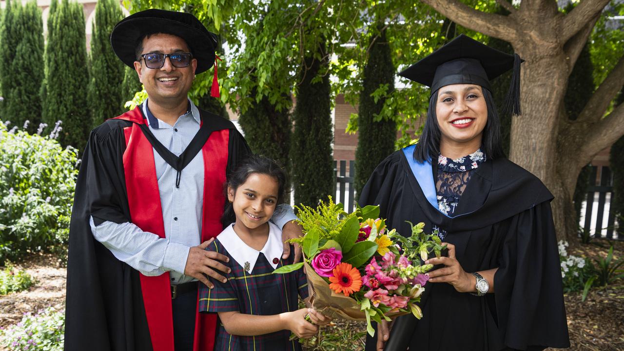 Bachelor of Medical Laboratory Science graduate and Valedictorian Pinkey Timilsina with Prajwal Gyawali of UniSQ's School of Health and Medicine and their daughter Anaya Gyawali at a UniSQ graduation ceremony at The Empire, Tuesday, October 29, 2024. Picture: Kevin Farmer