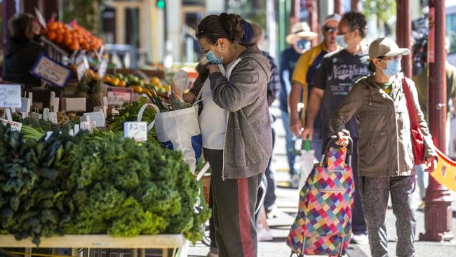 Shoppers return to the Queen VIctoria Market. Picture: Sarah Matray