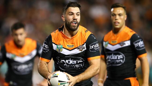 James Tedesco runs the ball in his final game for the Wests Tigers.