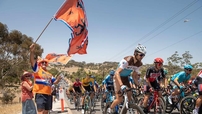 Dutch fan Jack van Hoof cheers on the peloton on Breakneck Hill Road in the Barossa Valley. Picture: Brad Fleet