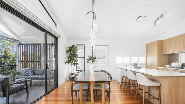 Fresh, bright and airy dining room with high ceilings at 65 Sandon Street, Graceville