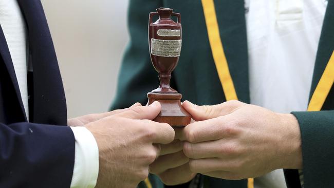 England captain Joe Root, left, and Australia's captain Tim Paine pose with the Ashes urn before the first Ashes Test match between England and Australia at Edgbaston in Birmingham, England. Picture: Mike Egerton/PA via AP