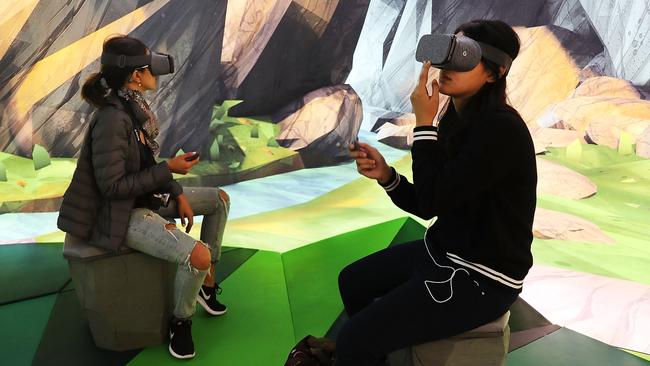 Women try Google’s Daydream View virtual reality headset. Picture: Spencer Platt/Getty Images/AFP