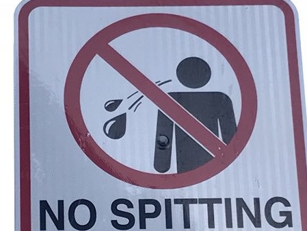 An old council sign installed in 1993 specifically prohibits spitting in the southern Sydney suburb of Hurstville. Picture: Twitter