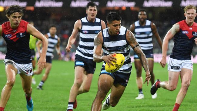 Tim Kelly and Geelong can clear the ball quickly from the centre. Picture: AAP